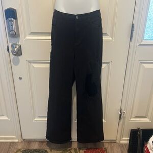VIBRANT wide leg black jeans with rip at knee. Size=11,Waist=29in, Length=32.5in